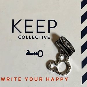 Keep collective dangling Mickey silver pave charm. Excellent with box. Disney.